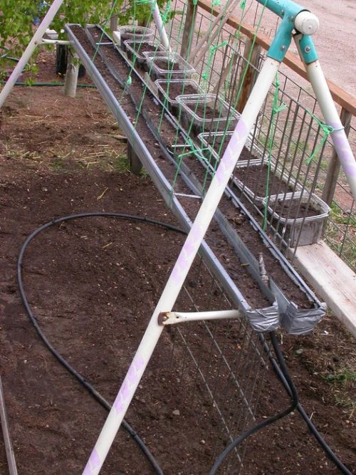 DIY Double Decker Recycled Swing Set Greenhouse